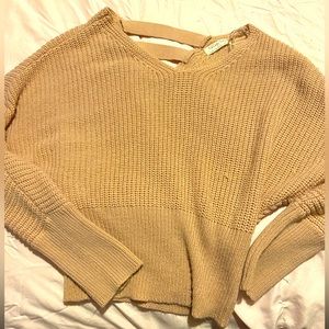 Tan 3/4 sleeve sweater, tight crop top waist, size medium.